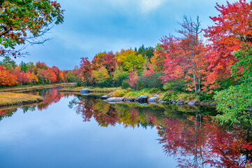 Lake and water reflections in foliage season
