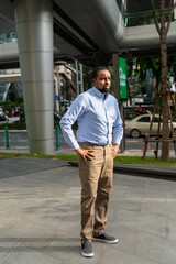 Portrait of handsome black man in city ready for business