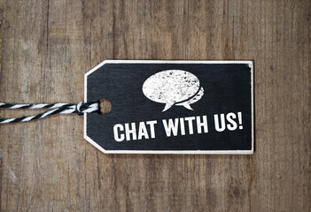Wooden black slate hang tag with customer support message chat with us 