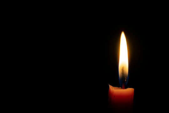 The candle is burning. Can be used as an advanced background.