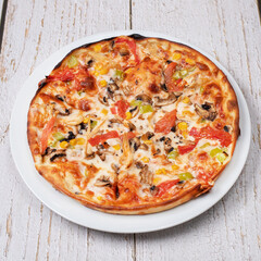 pizza with salami and mushrooms