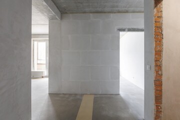 interior of the apartment without decoration in gray colors