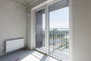 interior of the apartment without decoration in gray colors