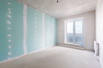 interior of the apartment without decoration in gray colors