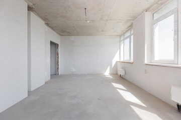 Fototapeta premium interior of the apartment without decoration in gray colors