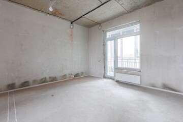 interior of the apartment without decoration in gray colors