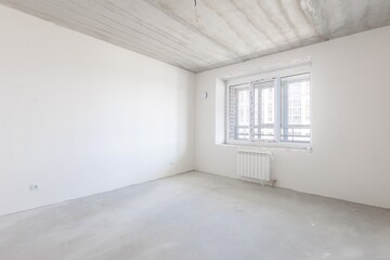 interior of the apartment without decoration in gray colors