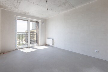 interior of the apartment without decoration in gray colors