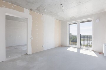 interior of the apartment without decoration in gray colors