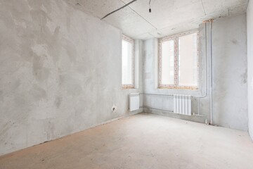 interior of the apartment without decoration in gray colors