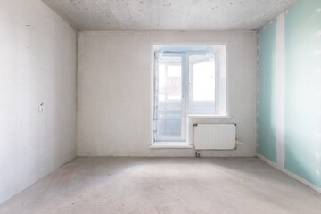 interior of the apartment without decoration in gray colors