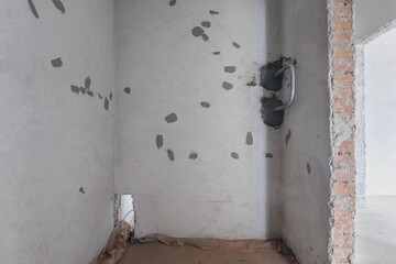 interior of the apartment without decoration in gray colors