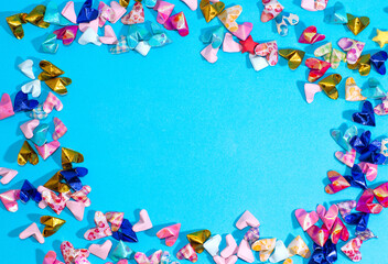 Fototapeta na wymiar paper hearts isolated on blue background