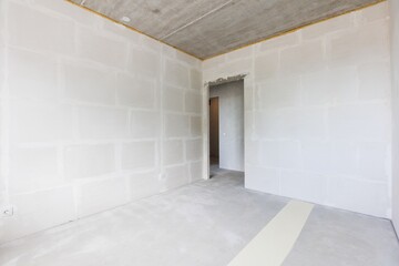 interior of the apartment without decoration in gray colors