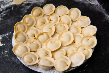 Traditional cuisine. Meat dumplings. Top view. Home made.