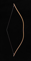 wooden hunting bow on a black background