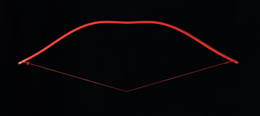 cupid bow on black background