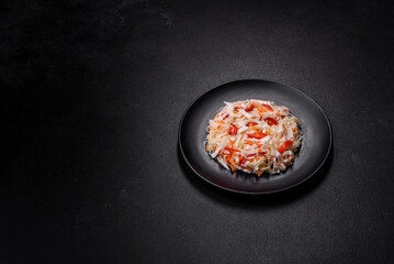 A delicious fresh vegetarian salad of white cabbage, carrot and paprika