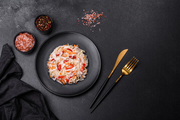 A delicious fresh vegetarian salad of white cabbage, carrot and paprika
