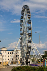 VLADIMIR, Russia - AUGUST, 18, 2022: Ferris wheel attraction in the park of the 850th anniversary of the city on a summer day