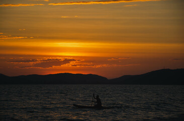 Naklejka na ściany i meble beautiful sunset on the sea in the evening