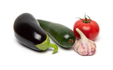 Preparing Healthy Food, Vegeterian, Vegan Concept. A set of fresh whole vegetables: zucchini, eggplant, tomato and garlic