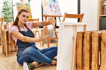 Young woman looking draw at art studio