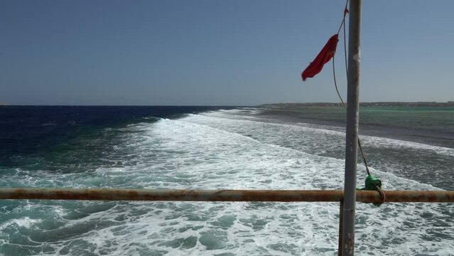 Big waves, storm and red flag. Pier near the hotel in Egypt. Strong wind. High quality 4k footage