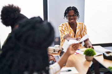 African american friends business workers sitting on table working at office