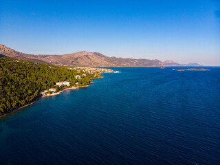 aerial view of the peljesac peninsula in croatia; croatian adriatic coastline as seen from a drone;...