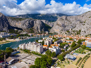 aerial view of the town of omiš in croatia, a picturesque town on the adriatic coast with the...