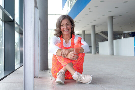 Portrait Of Cheerful Senior Woman In Sportwear