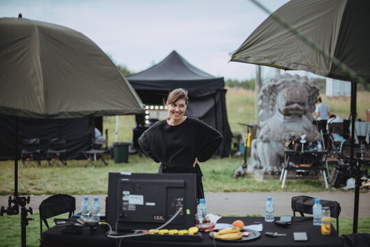 Director At Work On The Set. The Director Works With A Group Or With A Playback While Filming A Movie