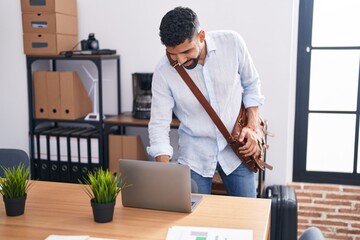 Fototapeta na wymiar Young arab man business worker using laptop working at office