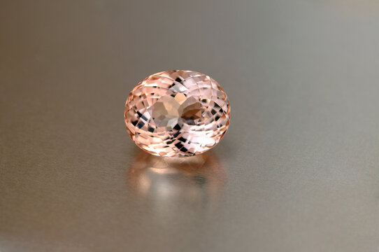 Rare rich peach pink colour genuine morganite beryl loose faceted stone setting for making expensive jewelry. Clean colorful flawless perfect portuguese oval cut natural mined unheated gemstone.