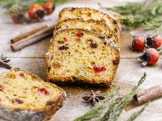 Christmas Stollen slice on the table. Winter decor