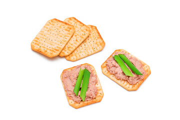 Crispy Salted Cracker with Liver Pate and Green Onions - Isolated on White. Easy Snack - Isolation