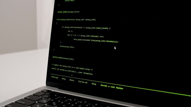Developer is browsing html code on the computer screen. Scroll of HTML Web Page Code. Programming code abstract technology background. Computer script concept. High quality 4k footage
