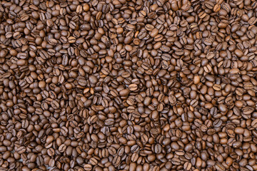 Texture of roasted coffee beans. Coffee beans.