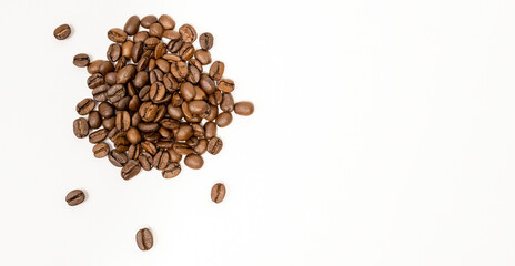 Aromatic coffee. Top view of coffee beans on white.