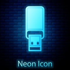 Glowing neon USB flash drive icon isolated on brick wall background. Vector