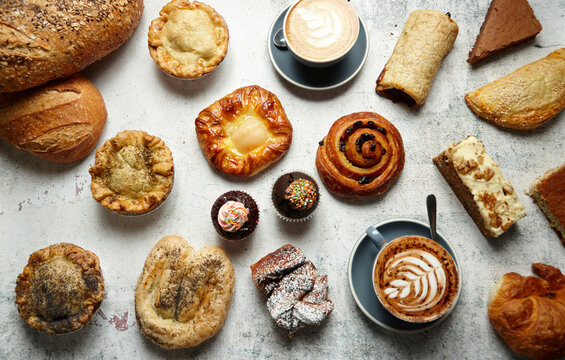 Flat lay of pastries and breads and coffee