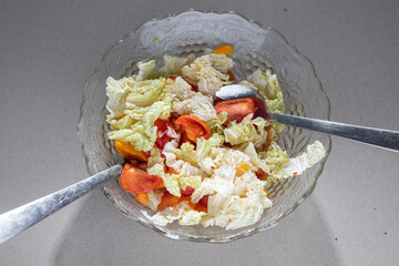 Fresh vegetable salad with cabbage and tomatoes