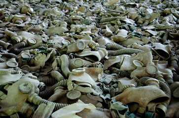 Ggas masks on the floor of Prypiat school, Chernobyl exclusion zone, Ukraine