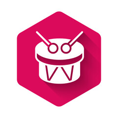 White Musical instrument drum and drum sticks icon isolated with long shadow background. Pink hexagon button. Vector
