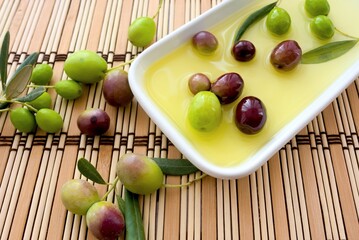 green olives on wooden table
