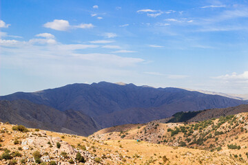 a beautiful landscape of mountains consecrated by sunlight