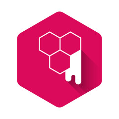 White Honeycomb icon isolated with long shadow background. Honey cells symbol. Sweet natural food. Pink hexagon button. Vector