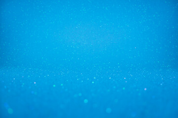 Fondo abstracto horizontal azul de purpurina brillante	
