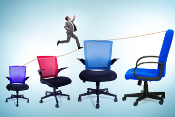 Promotion concept with businessman and chairs